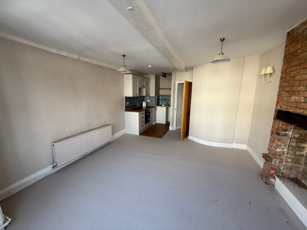 Lot: 81 - FREEHOLD INVESTMENT - View of living room and kitchen